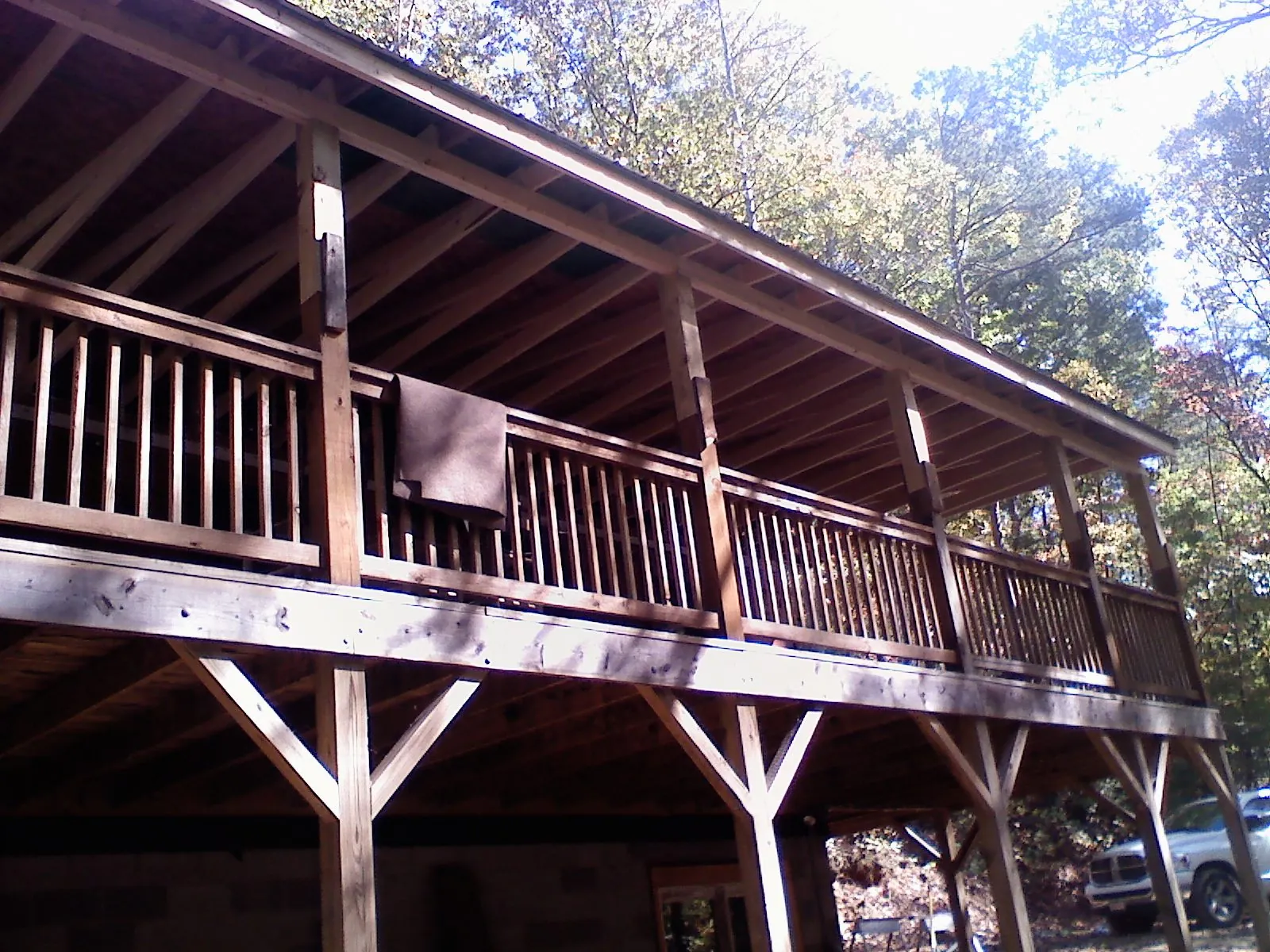 Timber framing under a new elevated porch and deck — Roof Leak Repair in Leominster by Roofing Brothers